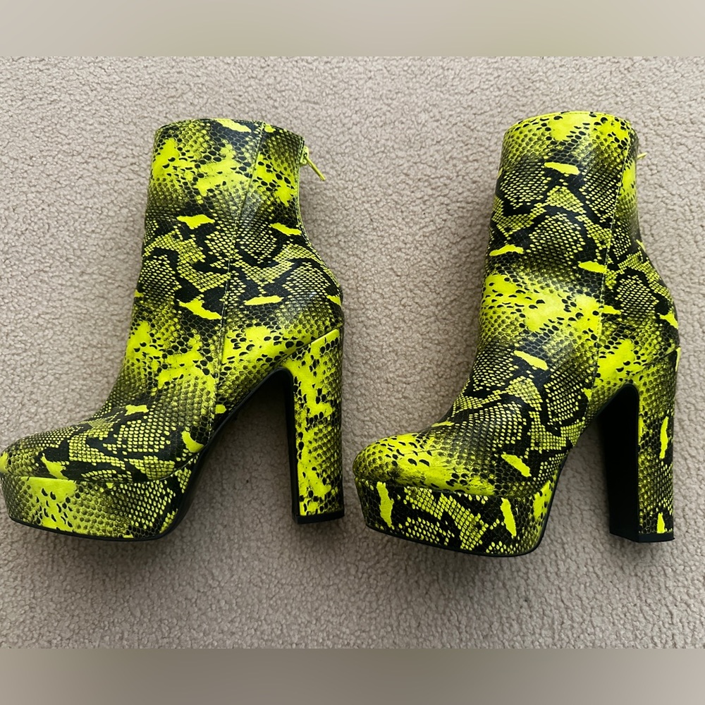 Yellow and black “snakeskin” boots
